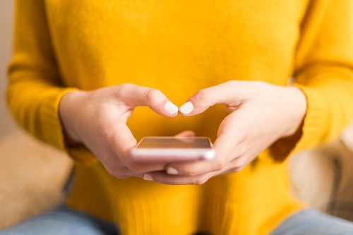 close-up-of-hands-texting-on-a-smartphone-2024-03-05-14-31-00-utc