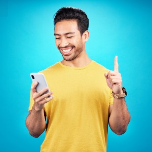 number-one-phone-and-man-isolated-on-blue-backgro-2023-11-27-05-35-01-utc